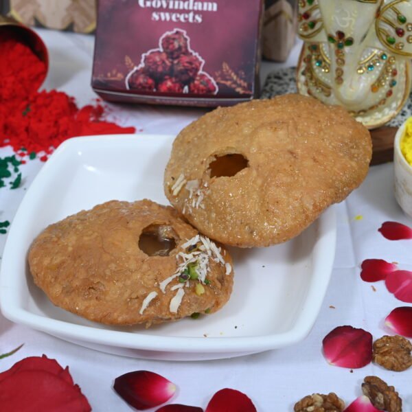 Golden fried Mawa Kachori stuffed with rich dry fruits.